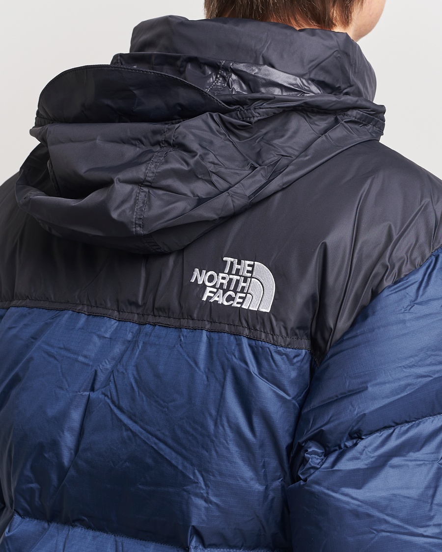 The north shops face veste nuptse 1996 down homme