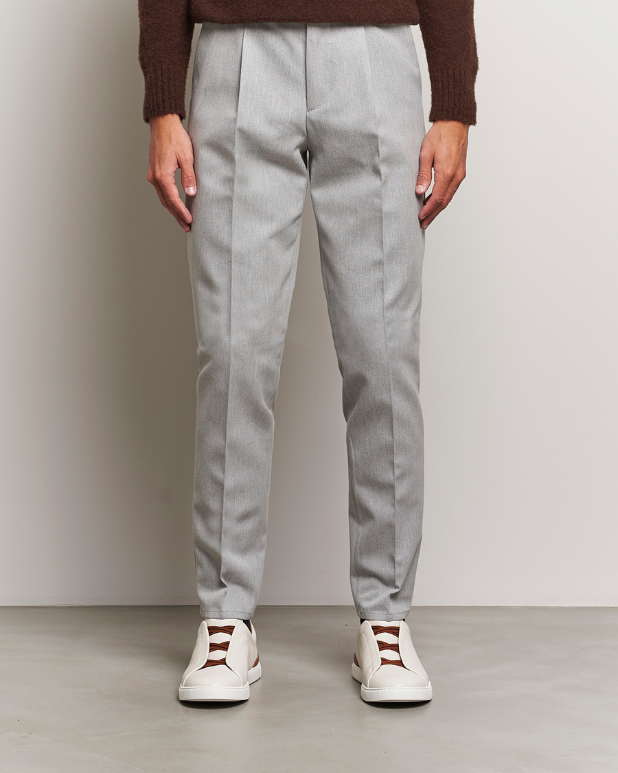 Homme | Luxury Brands | Brunello Cucinelli | Slim Fit Pleated Wool Trousers Light Grey