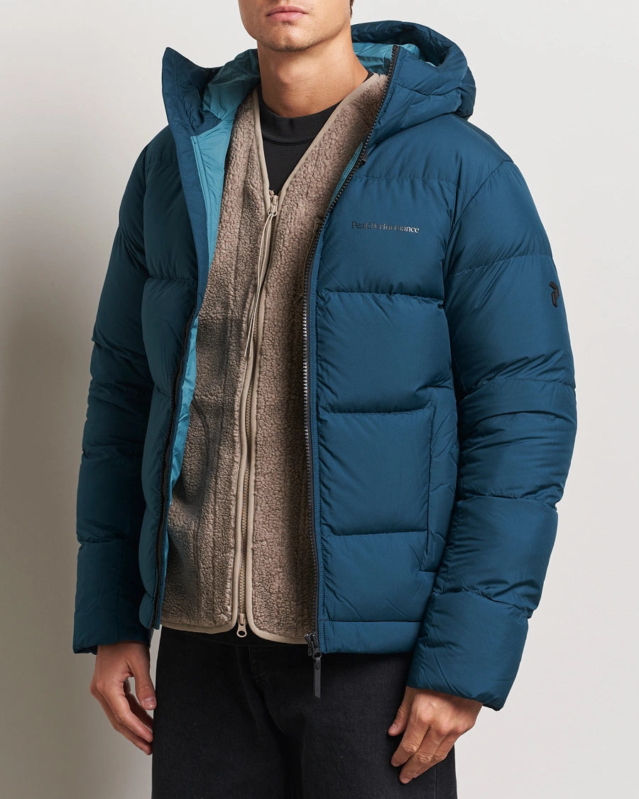 Homme |  | Peak Performance | Rivel Down Hooded Jacket Ininity Teel