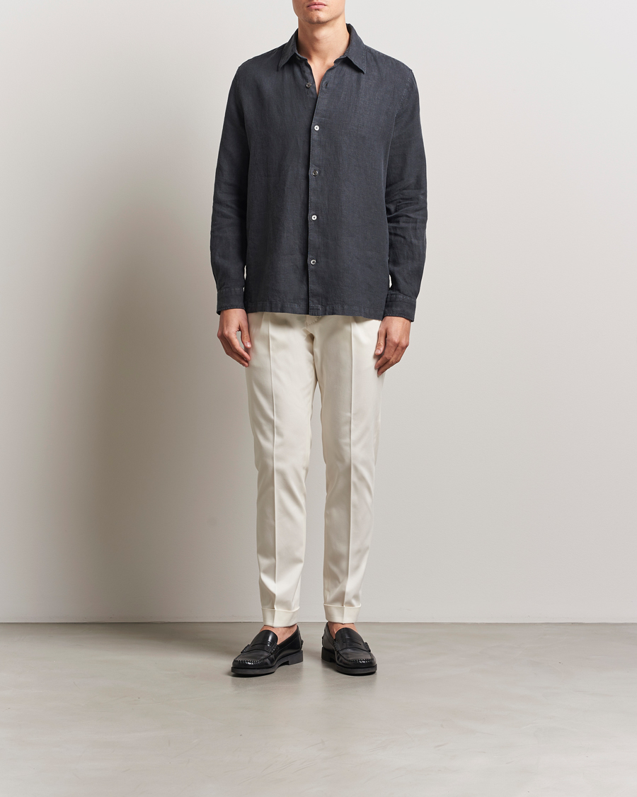 Homme | Pantalons | Tiger of Sweden | Tenuta Pleated Cotton Trousers Soft White
