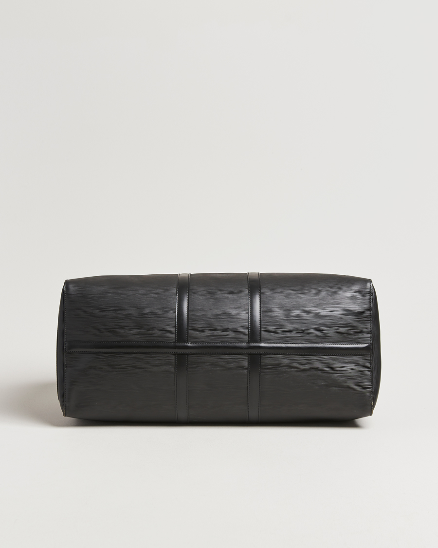 Homme | Louis Vuitton Pre-Owned Keepall 55 Epi Leather Bag Black | Louis Vuitton Pre-Owned | Keepall 55 Epi Leather Bag Black